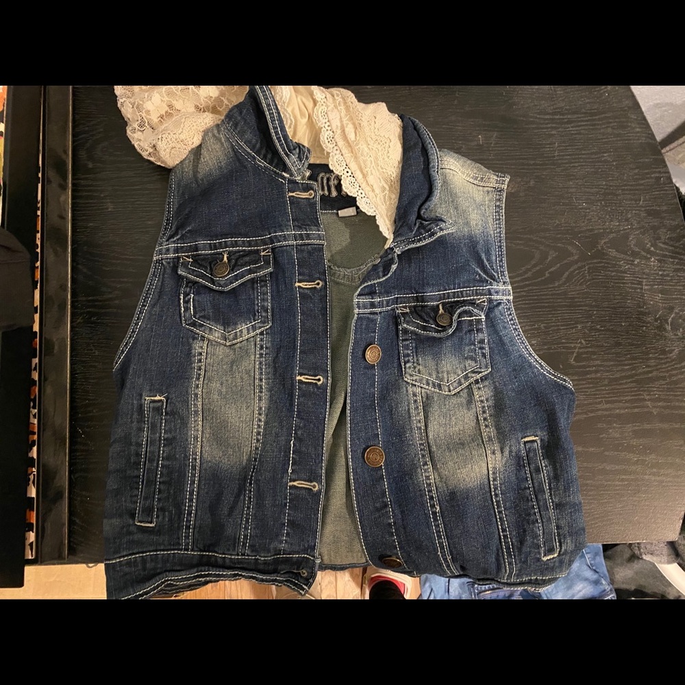 Distressed jean jacket vest
